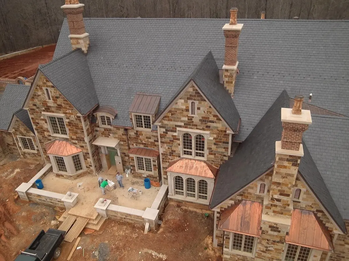 Craftsman Roofing Slate Roof Repair project in Greenwood Manor